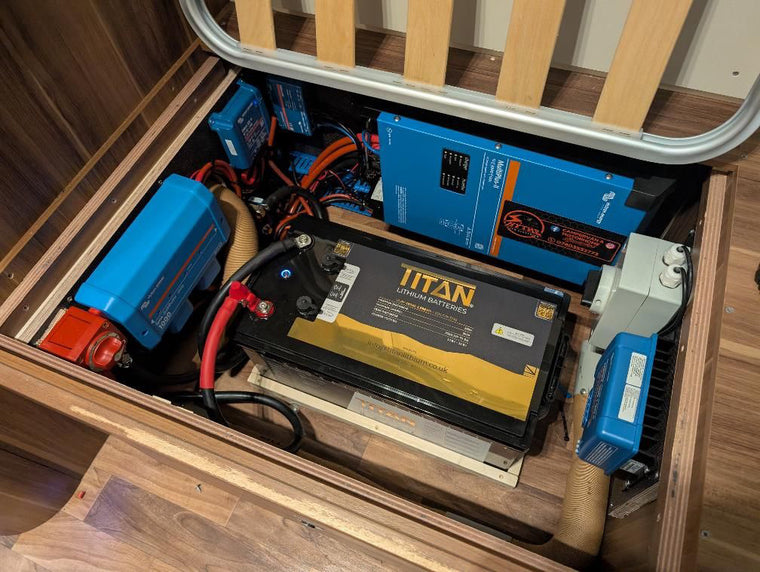 TITAN lithium battery with a Victron MultiPlus inverter-charger in a motorhome locker by Hythe Auto Electrics