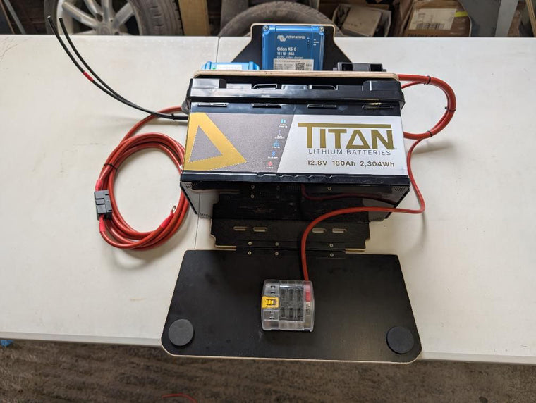 TITAN 180Ah lithium battery with a Victron Orion XS DC-DC charger on a Hythe Auto Electrics build plate