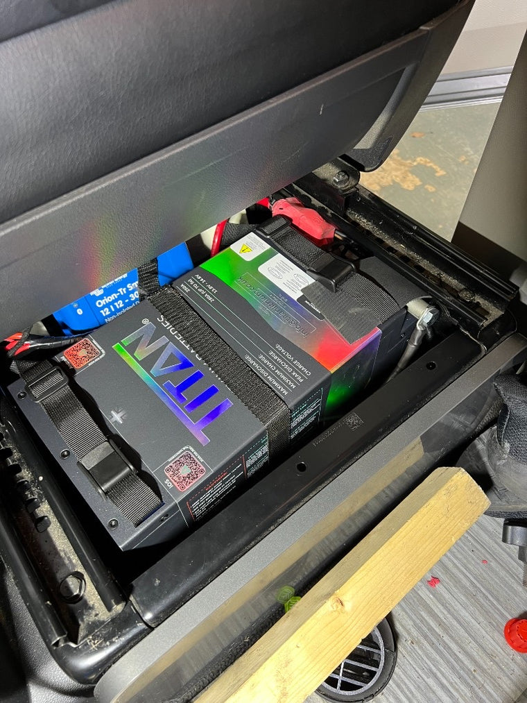 TITAN lithium battery fitted under the driver's seat of a VW California with a Victron Orion DC-DC charger