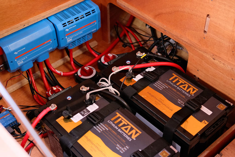 Twin Victron inverters and two TITAN 460Ah lithium batteries in a Runa, installed by Vision Marine