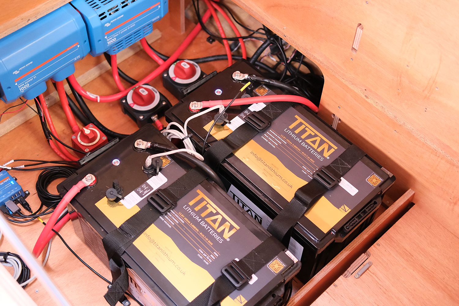 Two TITAN 460Ah batteries and Victron wiring aboard Runa, alternate angle